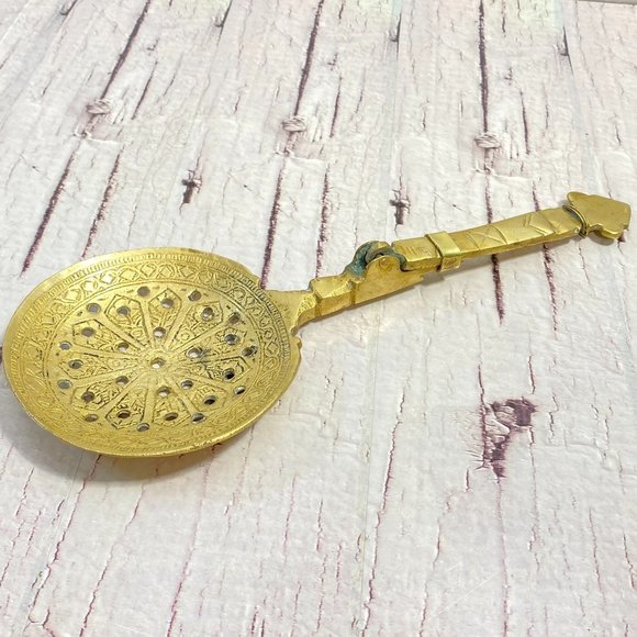 Decorative antique brass spoon with folding handle - Picture 1 of 9